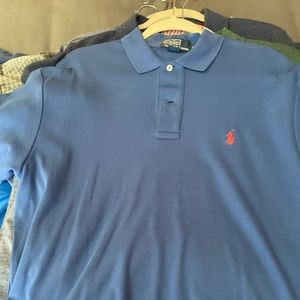 Men’s short sleeve polo style collared shirt.  Excellent condition.